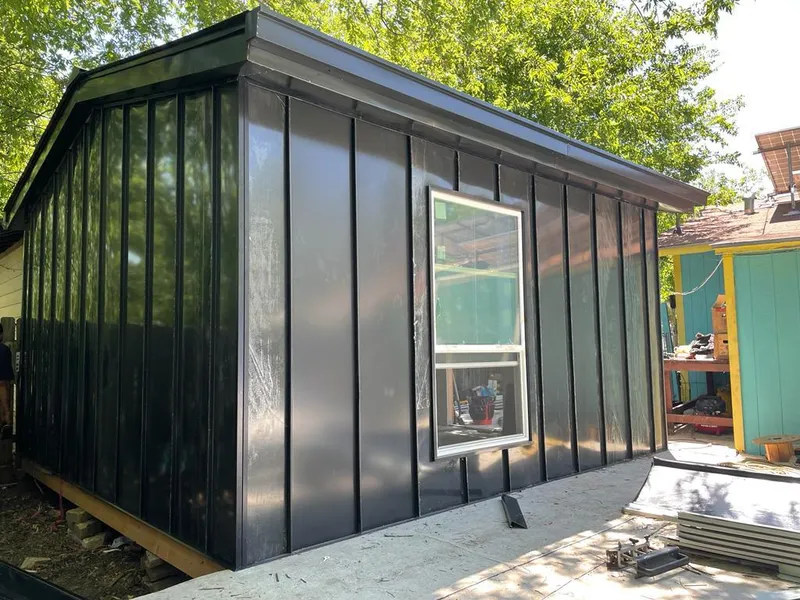 Black standing seam metal wall panels for Roof Inspection in Woodfin