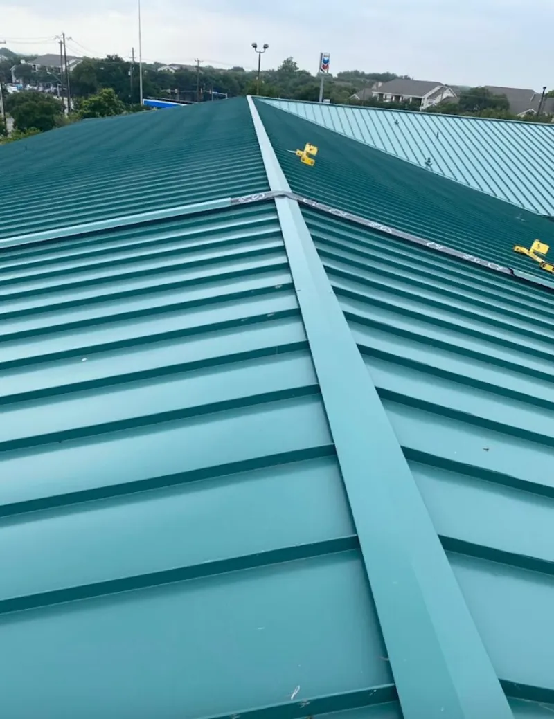 Green commercial metal roof ridge and valley for Metal Roof Repair in Woodfin